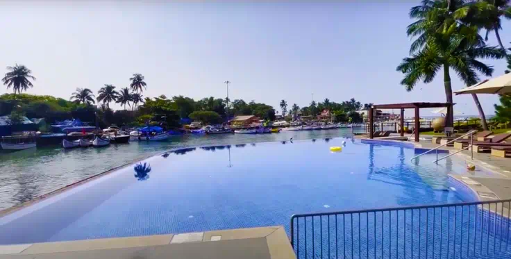 The tranquil infinity pool overlooking the Baga river